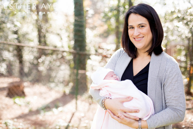 first time mom with newborn baby girl